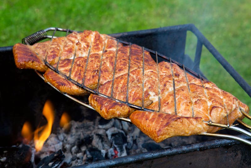 Salmon fillet on the grill .