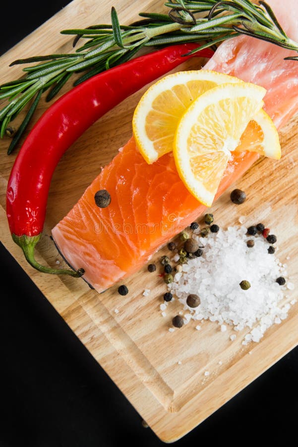 Salmon fillet with lemon stock image. Image of lemon 30385529