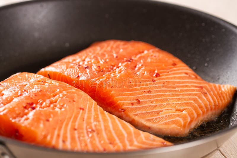 Salmon Fillet in a Pan. High quality photo. royalty free stock photo