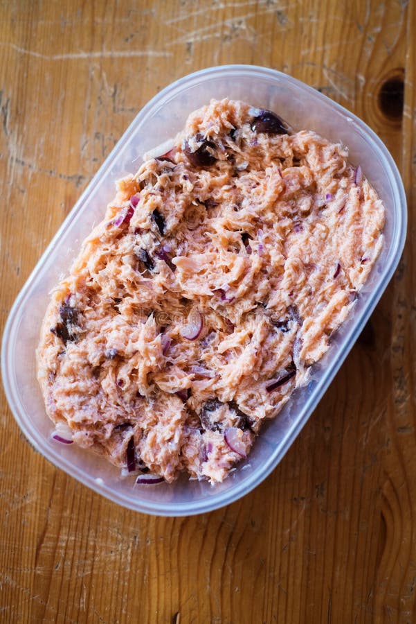 Salmon rillettes in a plastic container