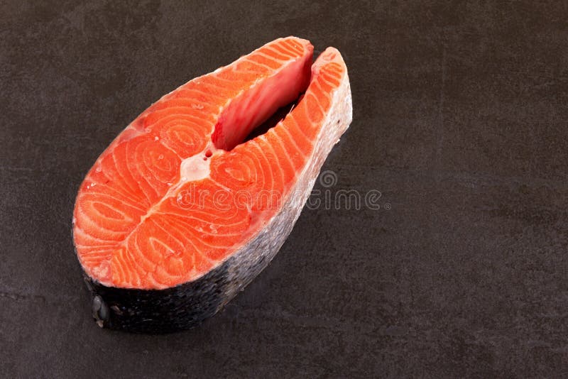 Salmon steak on black