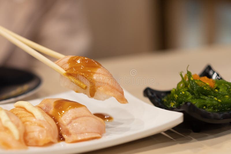 Salmon Sushi in Japanese Restaurant Stock Photo Image of menu, asian