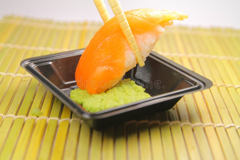 Salmon sushi and wasabi