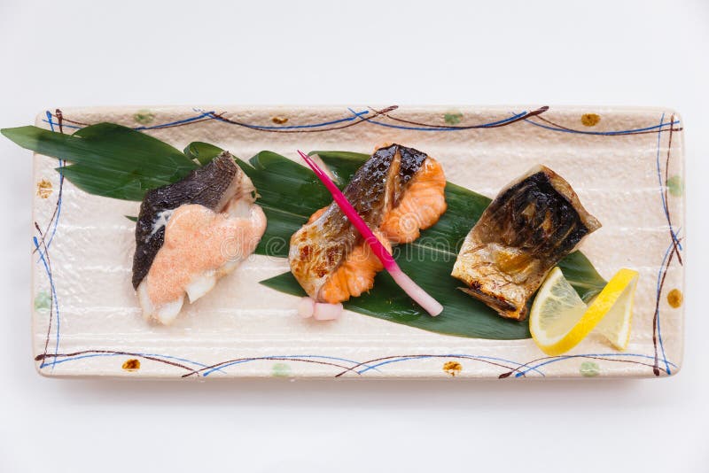 Salmon Teriyaki alto chiuso comprende tre pezzi di salmone Roasted con la salsa di Teriyaki immagine stock libera da diritti Salmon Teriyaki alto chiuso comprende tre pezzi di salmone Roasted con la salsa di Teriyaki immagine stock libera da diritti