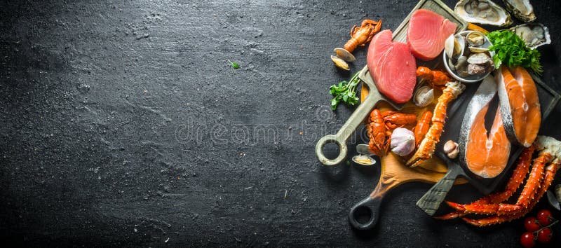 Salmon and tuna steaks with a variety of seafood and herbs