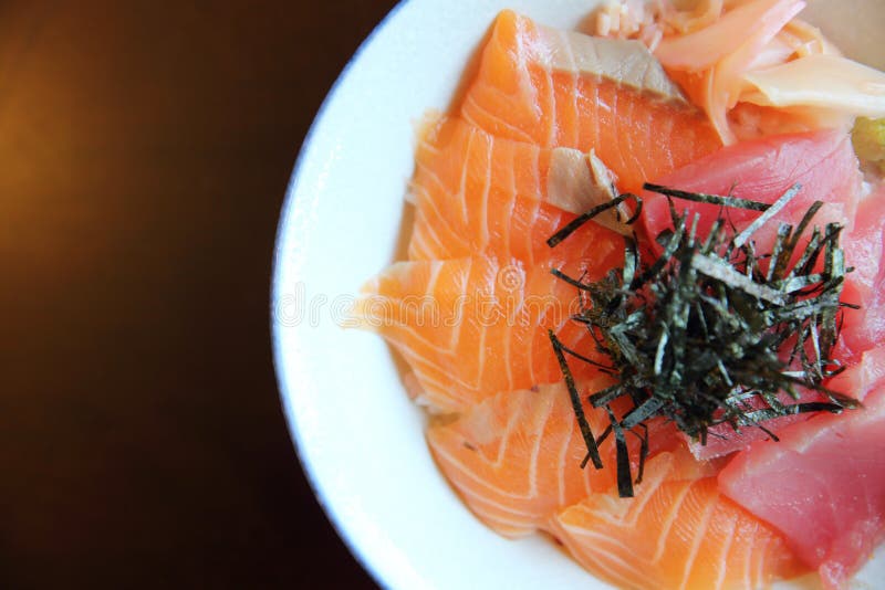 Salmon and tuna sushi don stock image. Image of avocado 89127185