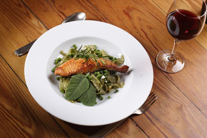 Salmon with wild garlic pasta