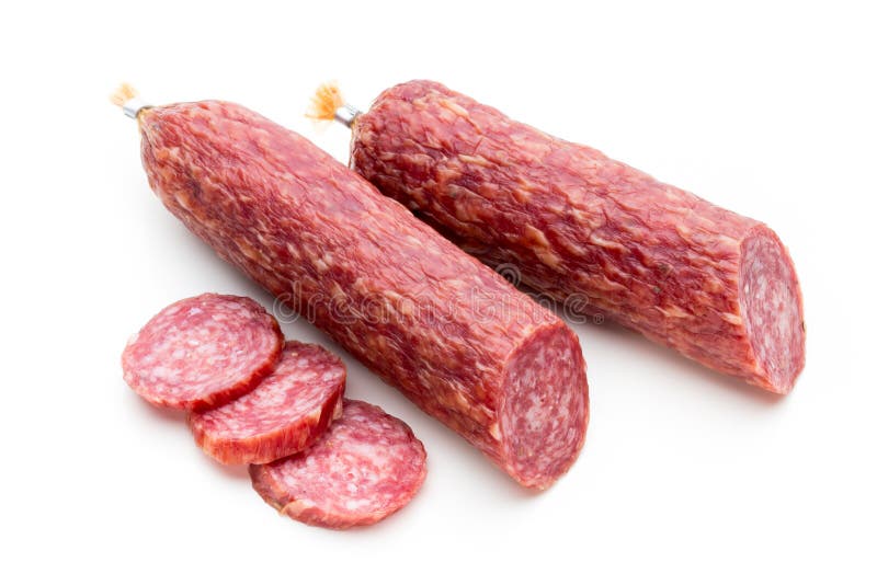 Salsiccia, foglie del basilico fumate salame e granelli di pepe isolati sopra fotografia stock libera da diritti Salsiccia, foglie del basilico fumate salame e granelli di pepe isolati sopra fotografia stock libera da diritti