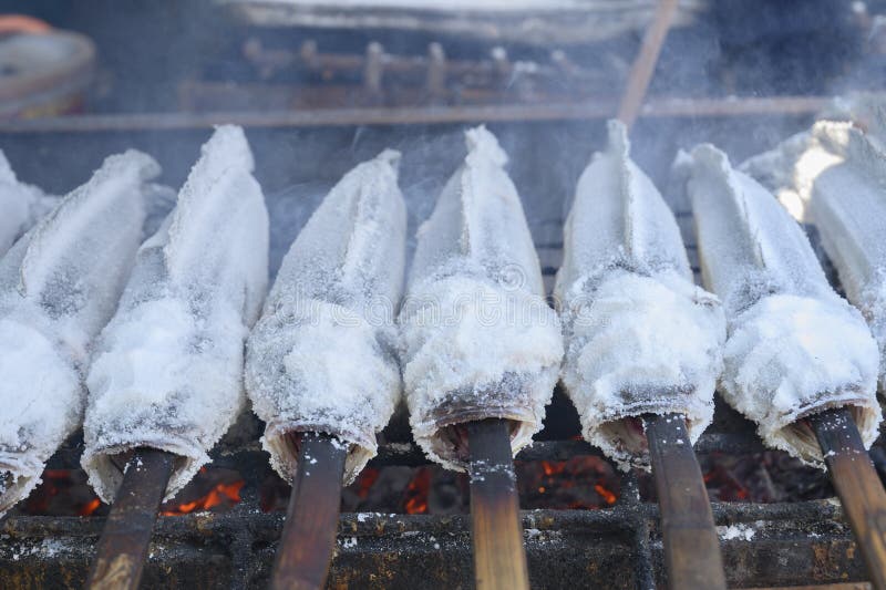 SaltCrusted Grilled Fish stock photo. Image of food 164464338