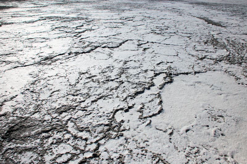 Salt dry and cracked lake Akrotiri in Cyprus stock photography