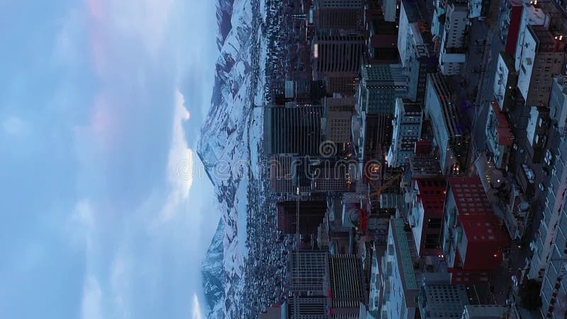 Salt Lake City Downtown in Winter. Utah, USA. Aerial View. Vertical Video. Salt Lake City Downtown in Winter on a Cloudy Morning. Utah, USA. Aerial View. Drone