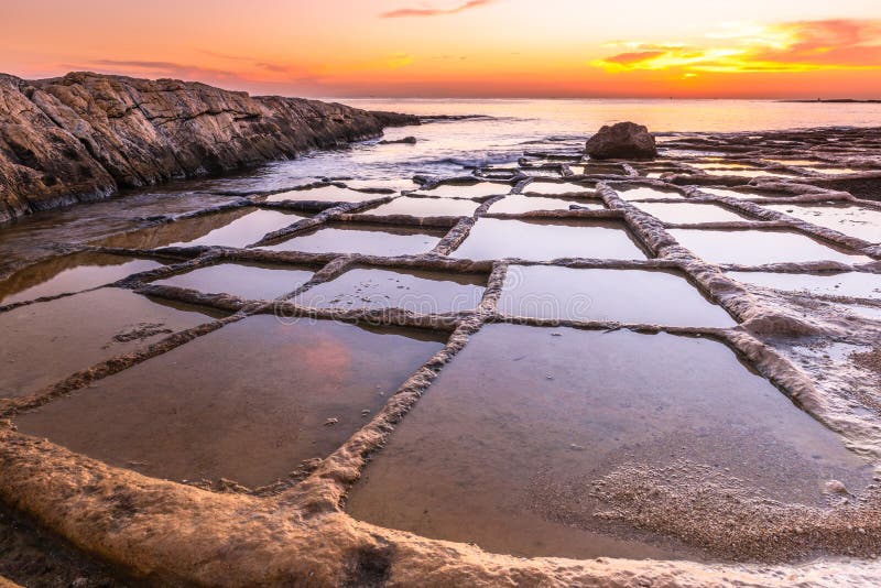 Salt Pans at Beach in Marsaskala, Malta at Sunrise Stock Image - Image