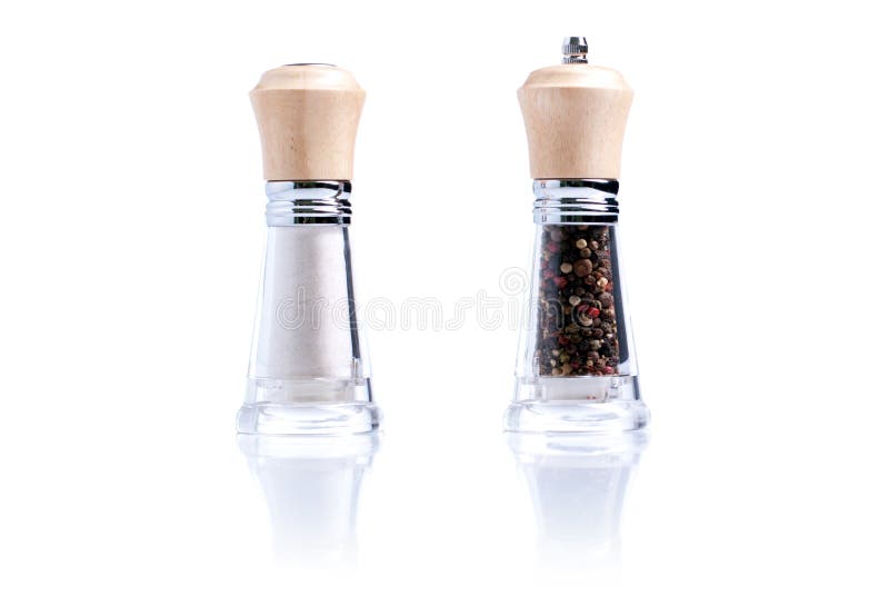 Salt and pepper isolated on white background with reflection