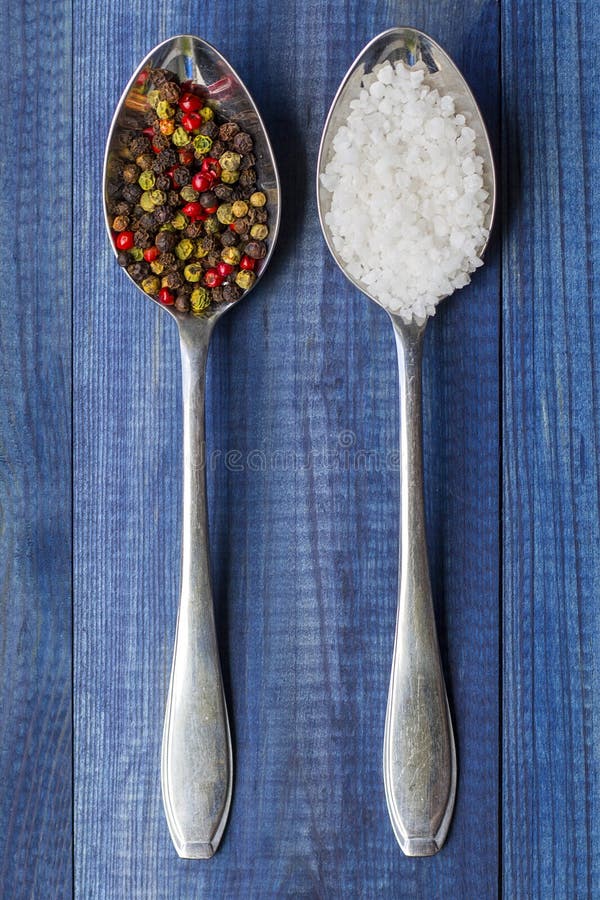 Salt and Pepper on Metal Spoons Stock Photo Image of powder, brown