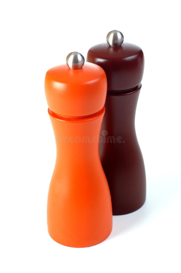 Salt and pepper shakers on white background