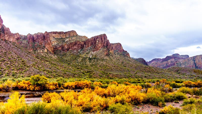 The Salt River and surrounding mountains with fall colored desert shrubs in central Arizona. United States of America royalty free stock photo The Salt River and surrounding mountains with fall colored desert shrubs in central Arizona. United States of America royalty free stock photo