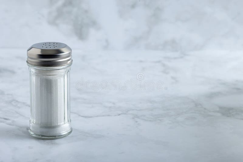 Salt shaker on marble countertop stock photos