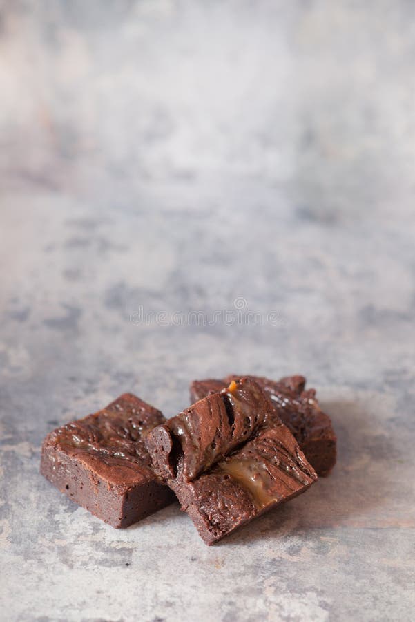 Salted Caramel Brownies on a Marble Background with Copy Space Stock