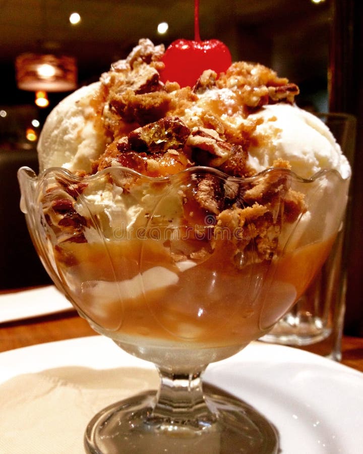 Salted Caramel Ice Cream Sundae with Candied Pecan Nuts & Cherry on Top ...