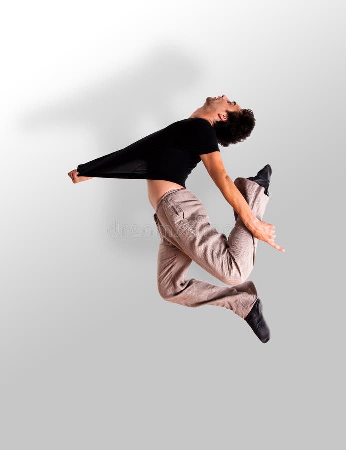 Salto con estilo del bailarín de ballet moderno fotografía de archivo Salto con estilo del bailarín de ballet moderno fotografía de archivo