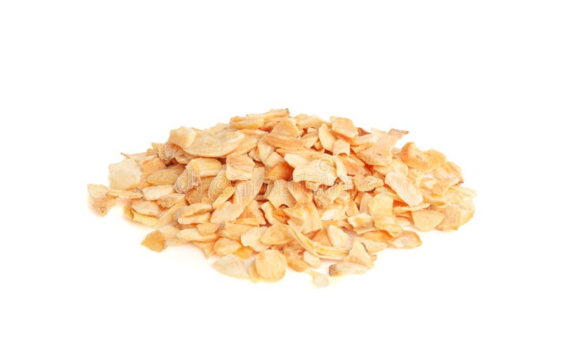Saltos de ajo seco Ropa frita crujiente Pile Closeup Gasas de ajo asado Flakes Clove Chip Group fotos de archivo