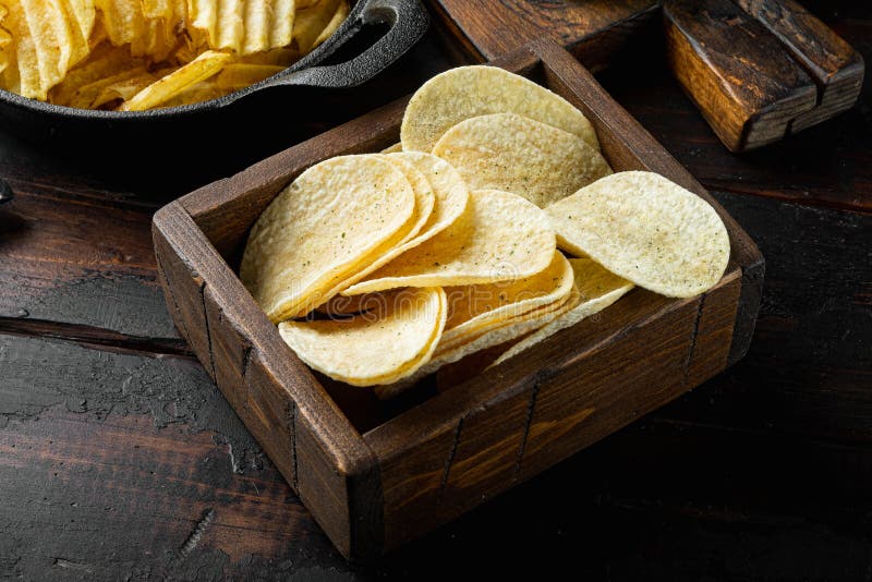 Salty Potato Chips Snack , on Old Dark Wooden Table Stock Image Image