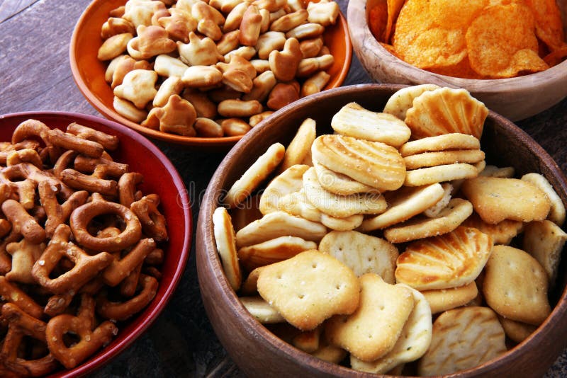 Salty Snacks. Pretzels, Chips, Crackers In Wooden Bowls. Stock Photo - Image of food, delicious ...