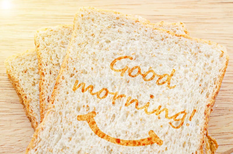 Salutation bonjour sur le froment panifiable grillé photographie stock Salutation bonjour sur le froment panifiable grillé photographie stock