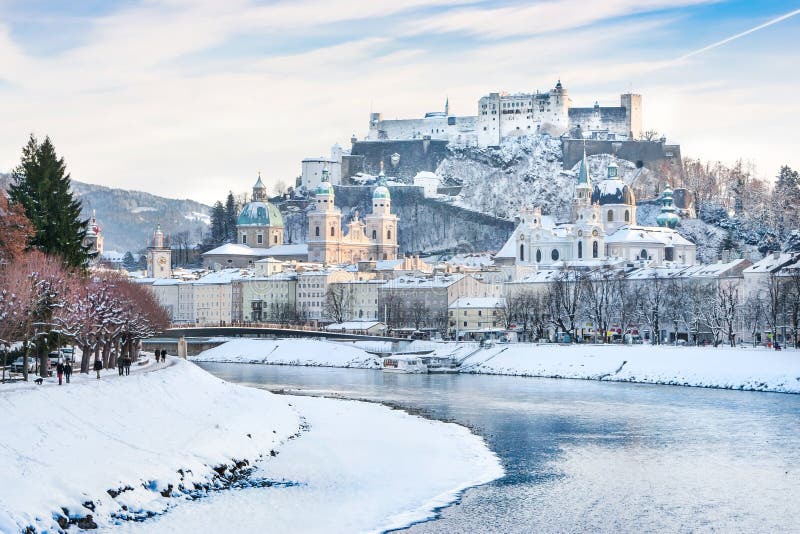 Salzburg skyline with Festung Hohensalzburg and river Salzach in winter, Salzburger Land, Austria