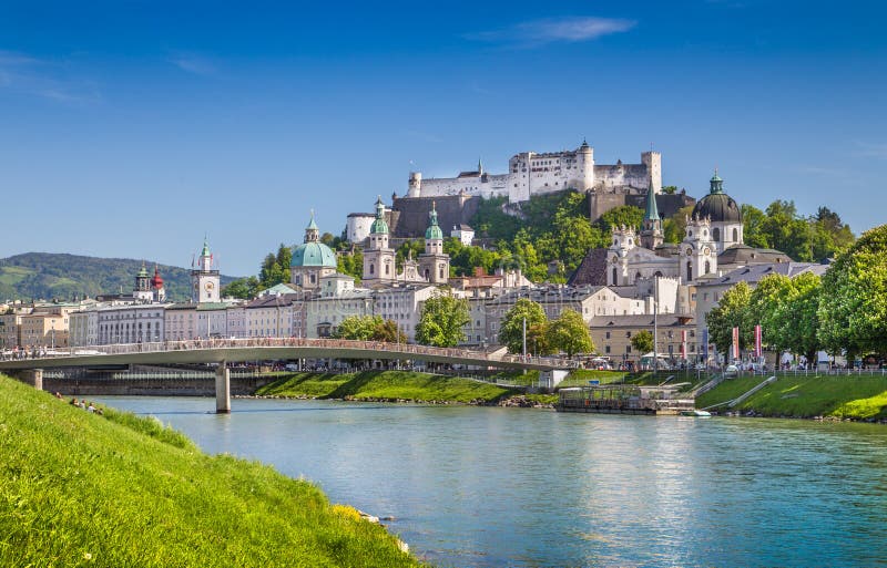 Salzburg skyline with Festung Hohensalzburg and Salzach river in summer