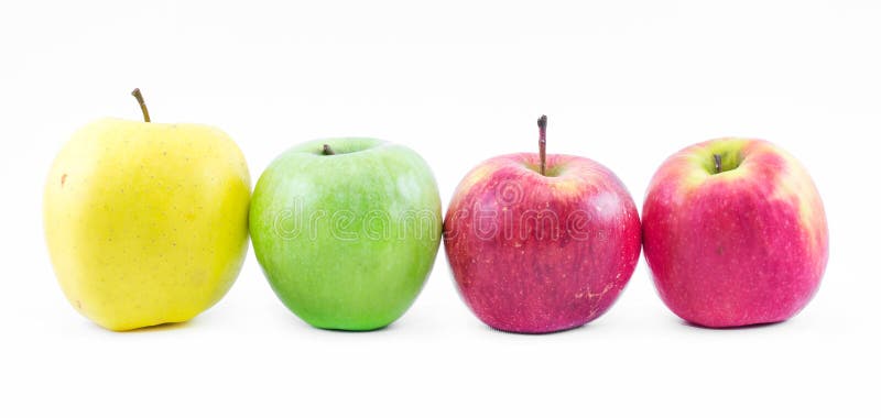 Samenstelling van drie die types van appelen naast elkaar op een witte groen, gele achtergrond worden opgesteld - en rood - still royalty-vrije stock foto Samenstelling van drie die types van appelen naast elkaar op een witte groen, gele achtergrond worden opgesteld - en rood - still royalty-vrije stock foto