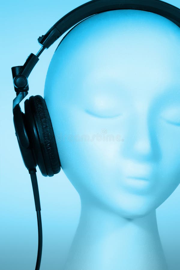 Female mannequin head listening to music with red overlay. Female mannequin head listening to music with red overlay