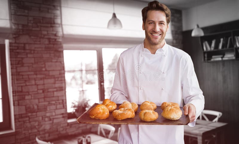 Portrait of male chef holding tray with bread against empty chairs and tables. Portrait of male chef holding tray with bread against empty chairs and tables