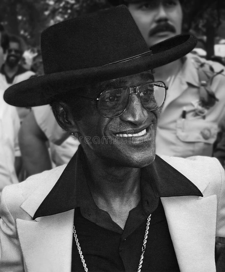 Multi-talented entertainment legend, Sammy Davis Jr., arrives at a senior citizens` picnic in Chicago, Illinois, in June, 1978. Davis was a singer/recording artist, actor, comedian and a humanitarian known for his civil rights activism and philanthropy. He was born in Harlem in New York City on July 8, 1925 and died from throat cancer in Beverly Hills, California on May 16, 1990 at the age of 64.