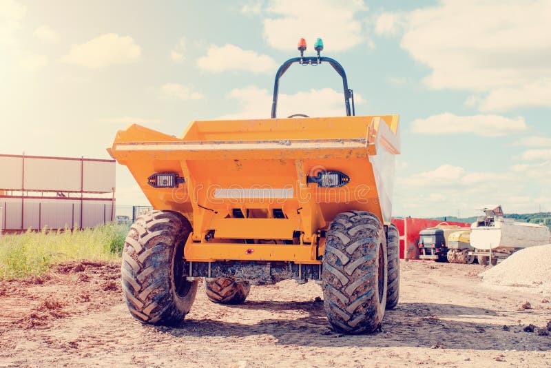 Dumper truck on a construction site. Dumper truck on a construction site