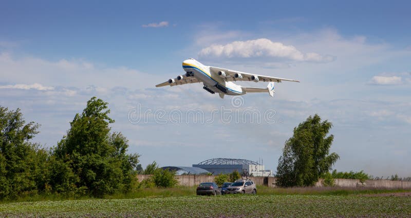 The plane Antonov 225 AN-225 Mriya fly, the biggest airplane in the world taking off from the airport. UR-82060 largest aircraft flying in the sky. Ukraine, Hostomel - August 18, 2021. The plane Antonov 225 AN-225 Mriya fly, the biggest airplane in the world taking off from the airport. UR-82060 largest aircraft flying in the sky. Ukraine, Hostomel - August 18, 2021.