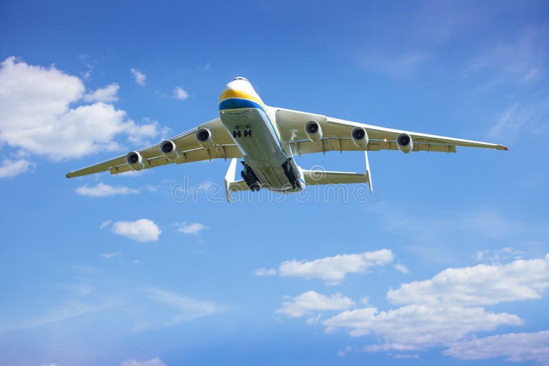 The plane Antonov 225 AN-225 Mriya fly, the biggest airplane in the world taking off from the airport. UR-82060 largest aircraft flying in the sky. Ukraine, Hostomel - August 18, 2021. The plane Antonov 225 AN-225 Mriya fly, the biggest airplane in the world taking off from the airport. UR-82060 largest aircraft flying in the sky. Ukraine, Hostomel - August 18, 2021.