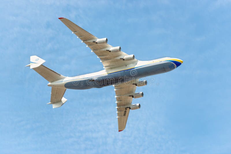 KIEV, UKRAINE - AUGUST 24, 2022: Mriya plane flight jet on blue sky. The biggest plane An-225 Mriya, destroyed by Russian occupants in Hostomel, Ukraine. KIEV, UKRAINE - AUGUST 24, 2022: Mriya plane flight jet on blue sky. The biggest plane An-225 Mriya, destroyed by Russian occupants in Hostomel, Ukraine