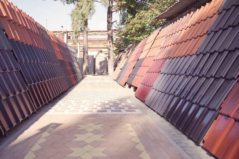 Samples of Ceramic Roofing Tiles in a Warehouse of a Roofing Mat Stock