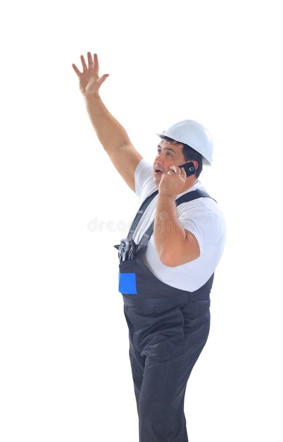 Male builder screaming and talking on mobile phone. Male builder screaming and talking on mobile phone