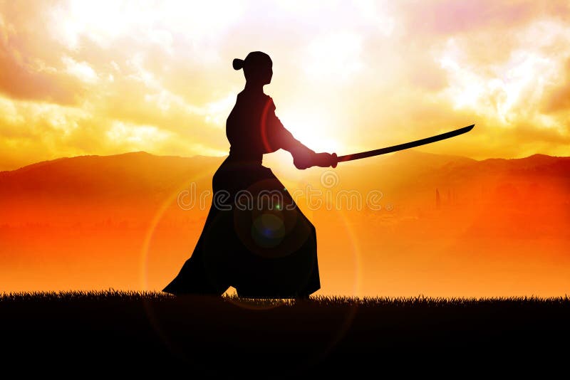 Silhouette of a samurai posing during sunset. Silhouette of a samurai posing during sunset