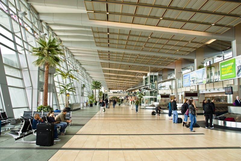 Baggage claim at airport editorial stock photo. Image of conveyor - 100851003