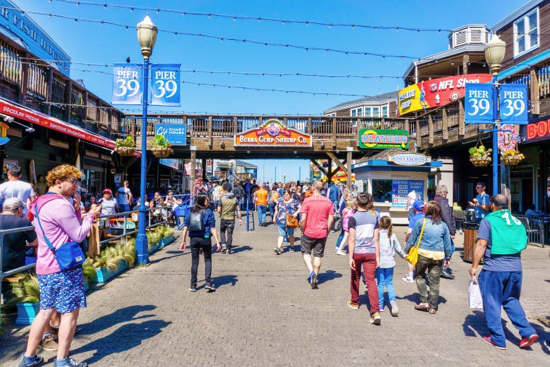 Tourists on Fisherman`s Wharf, Pier 39 at Carousel Editorial Stock