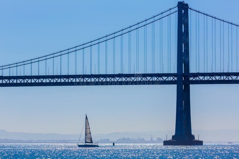 San Francisco Bay bridge sailboat from Pier 7 California