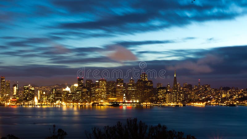 San Francisco Bay Bridge and skyline at night stock photos San Francisco Bay Bridge and skyline at night stock photos