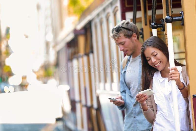 San Francisco cable car people on mobile phone app stock images San Francisco cable car people on mobile phone app stock images