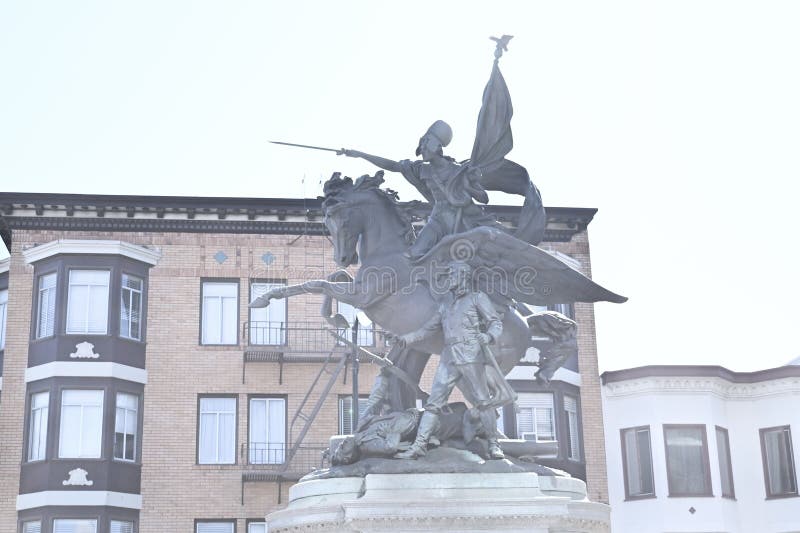 San Francisco California Volunteers Monument is a sculpture dedicated to the solders of the Spanish American War,of April through August 1898. Originally located on Van Ness Avenue at Market Street,the location was criticized as it made the statue,a granite base 10 feet (3 meters) tall holding the 16 foot (4.9 meter) tall by 10 foot (3 meter) long bronze sculpture look insignificant. This location,Dolores and Market Streets,was chosen as it really stands out much better. Although the figure riding the horse is supposed to be the ancient Roman Goddess Bellona,the Goddess of War,some people have thought it is Nike,the Greek Goddess of Victory. As seen 16 August 2023. San Francisco California Volunteers Monument is a sculpture dedicated to the solders of the Spanish American War,of April through August 1898. Originally located on Van Ness Avenue at Market Street,the location was criticized as it made the statue,a granite base 10 feet (3 meters) tall holding the 16 foot (4.9 meter) tall by 10 foot (3 meter) long bronze sculpture look insignificant. This location,Dolores and Market Streets,was chosen as it really stands out much better. Although the figure riding the horse is supposed to be the ancient Roman Goddess Bellona,the Goddess of War,some people have thought it is Nike,the Greek Goddess of Victory. As seen 16 August 2023.