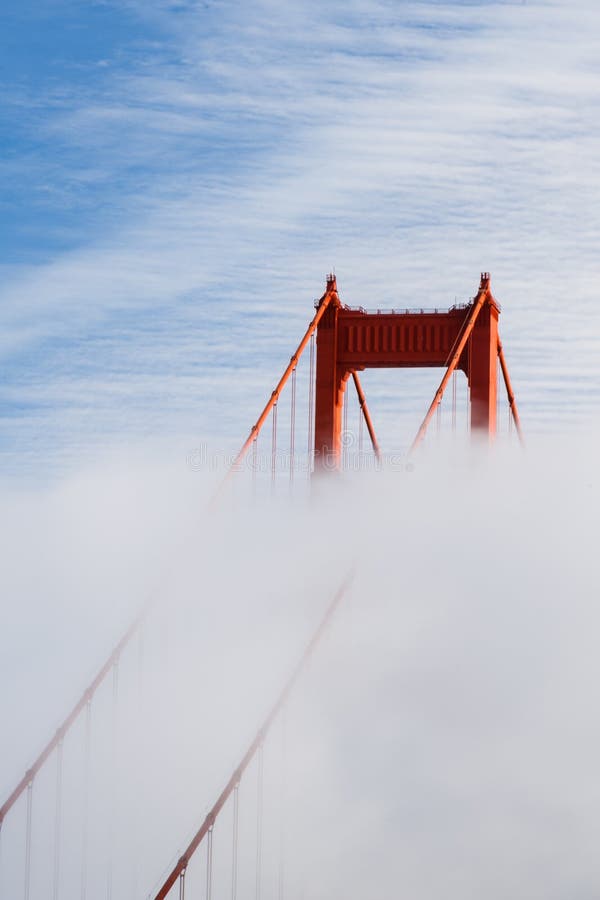 San Francisco Golden Gate Bridge tower in the fog stock images