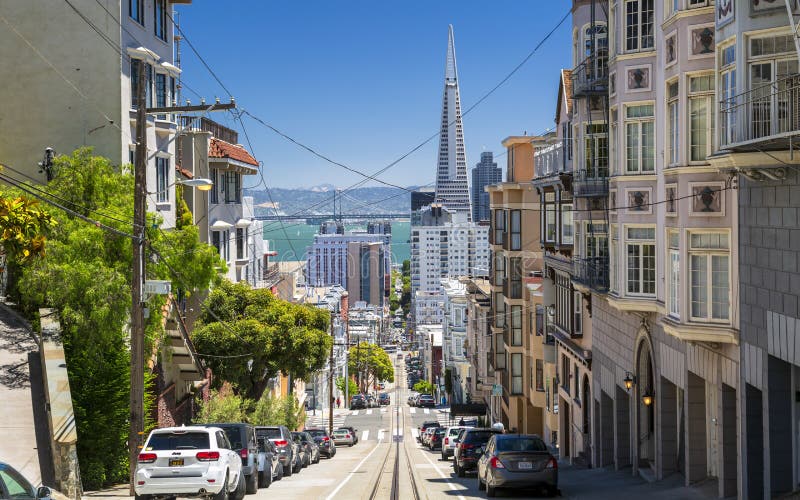 Street view of Transamerica Pyramid and Oakland Bay bridge San Francisco, California, USA, North America royalty free stock photo Street view of Transamerica Pyramid and Oakland Bay bridge San Francisco, California, USA, North America royalty free stock photo