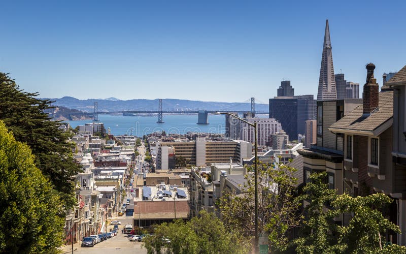 Street view of Transamerica Pyramid and Oakland Bay bridge San Francisco, California, USA, North America royalty free stock photos Street view of Transamerica Pyramid and Oakland Bay bridge San Francisco, California, USA, North America royalty free stock photos